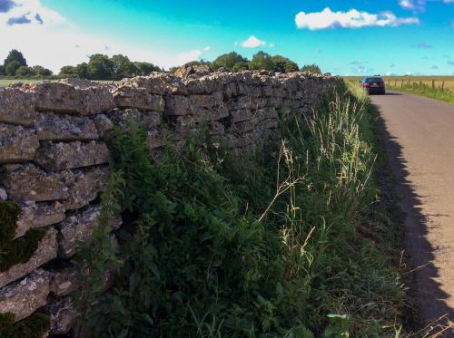 Wall made from the airfield on Green Lane.