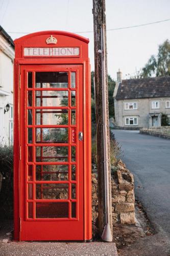 Sited next to village shop, it was changed in 2020 from a telephone box to house a defibrillator.