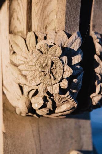 Detail of the carvings on the church lychgate.