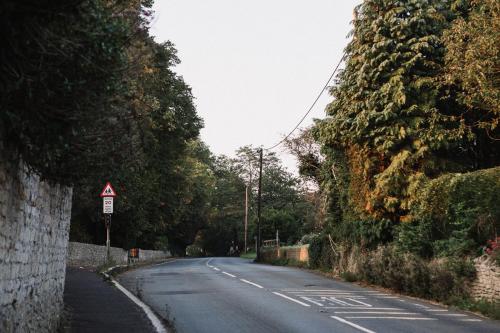 Main road leaving village centre towards church.